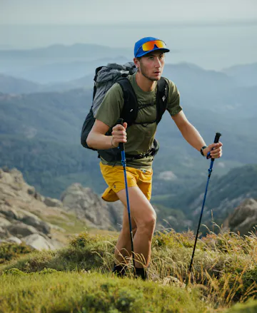 A through hiker uses Black Diamond Distance Carbon FLZ trekking poles. 