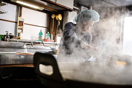Steamy kitchen of the Udon noodle shop