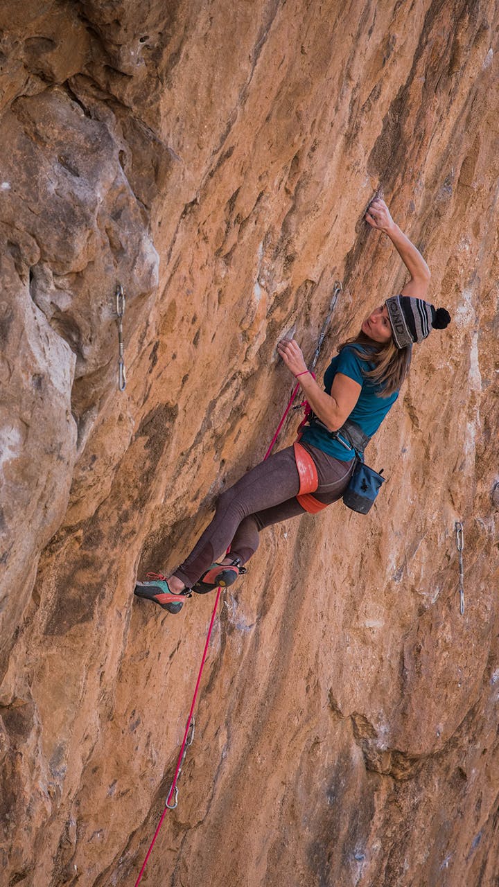 climber working up a route