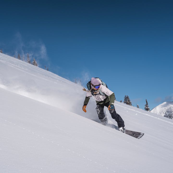 BD athlete Kelly Halpin Snowboarding in the backcountry. 