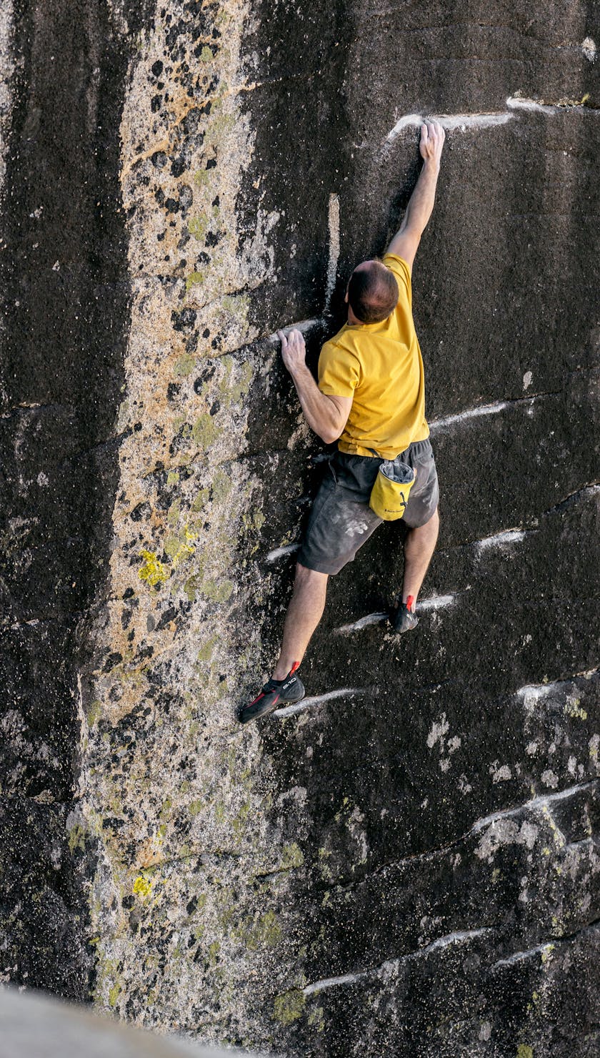 Carlo Traversi climbing a route