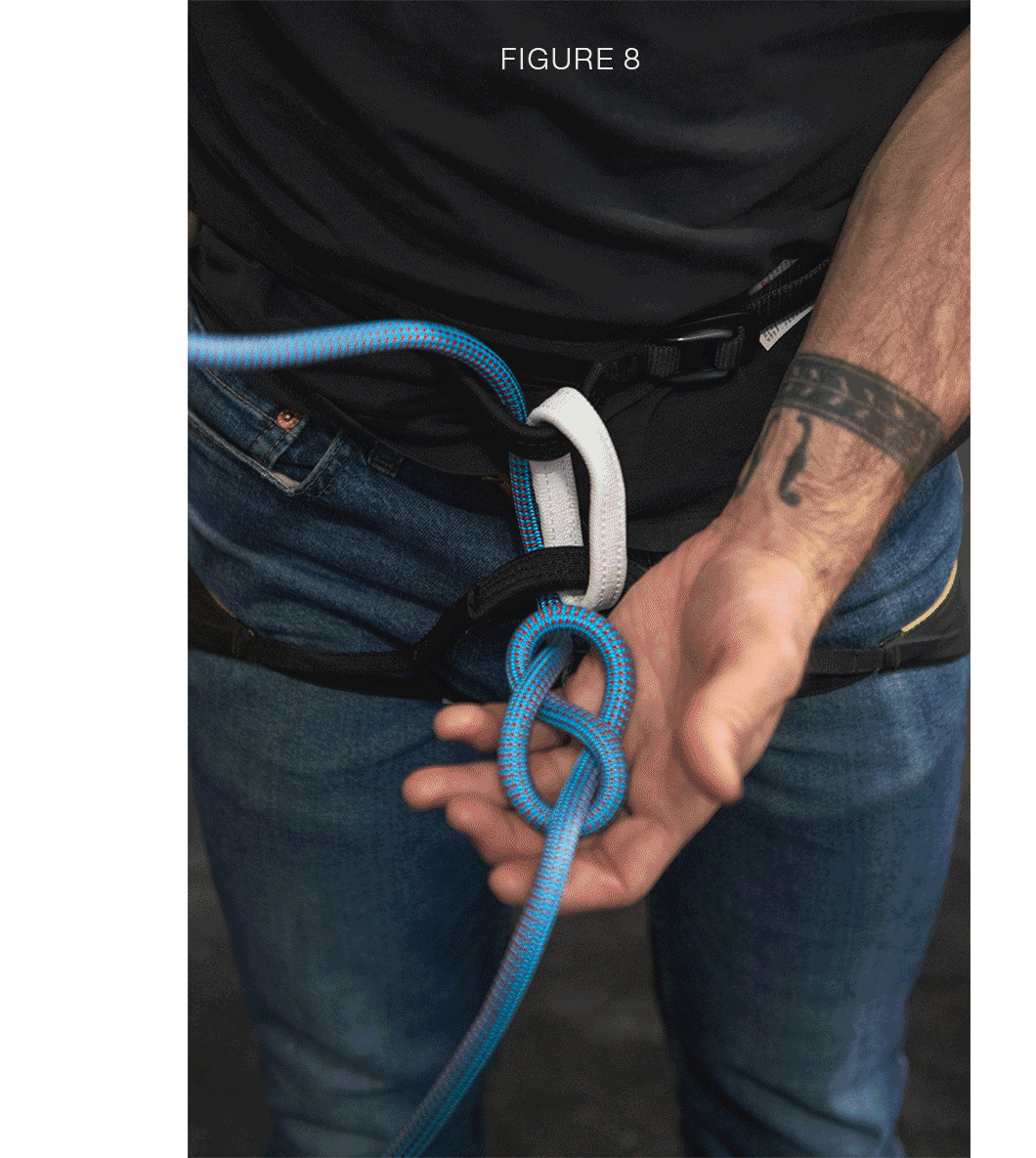 A climber ties in with a figure 8 knot.