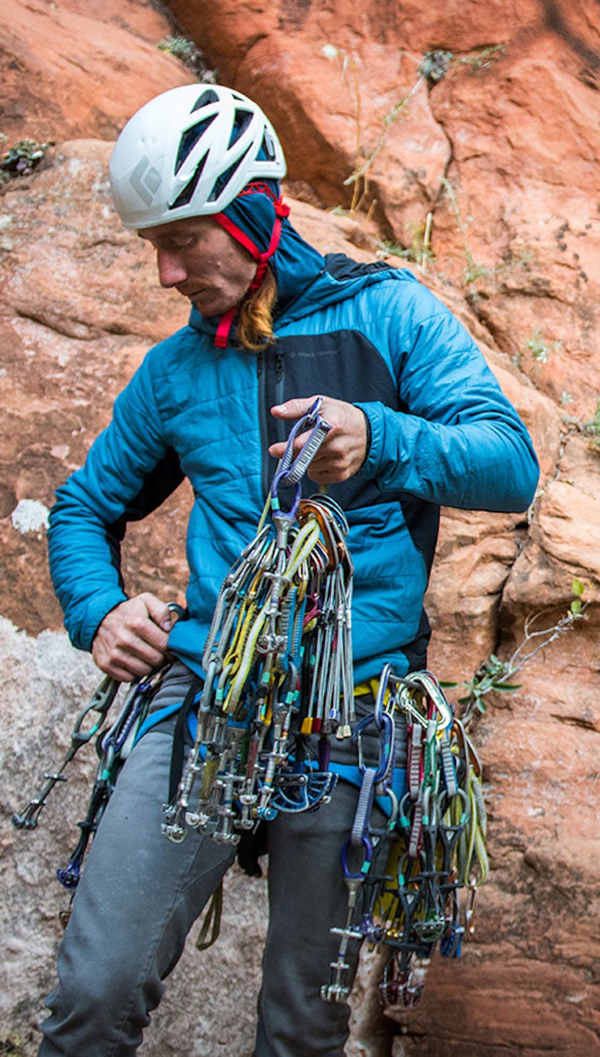 Photograph by Andy Earl of Big Wall Paul with rock climbing gear | gear loops