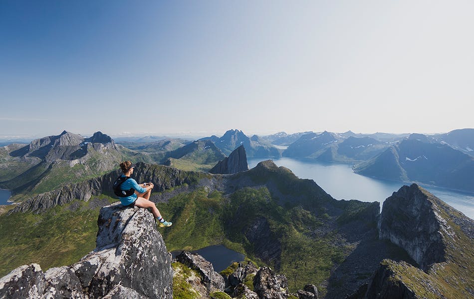 Hillary Gerardi sits on a peak in Norway