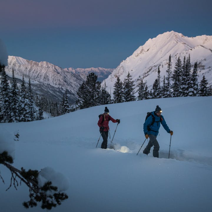 Two Skiers out for a dawn patrol. 