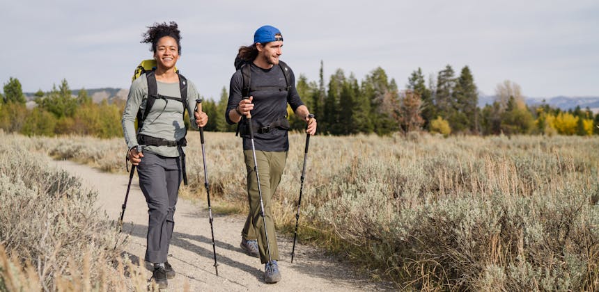 Two hikers use Black Diamond Trail Cork Trekking poles.