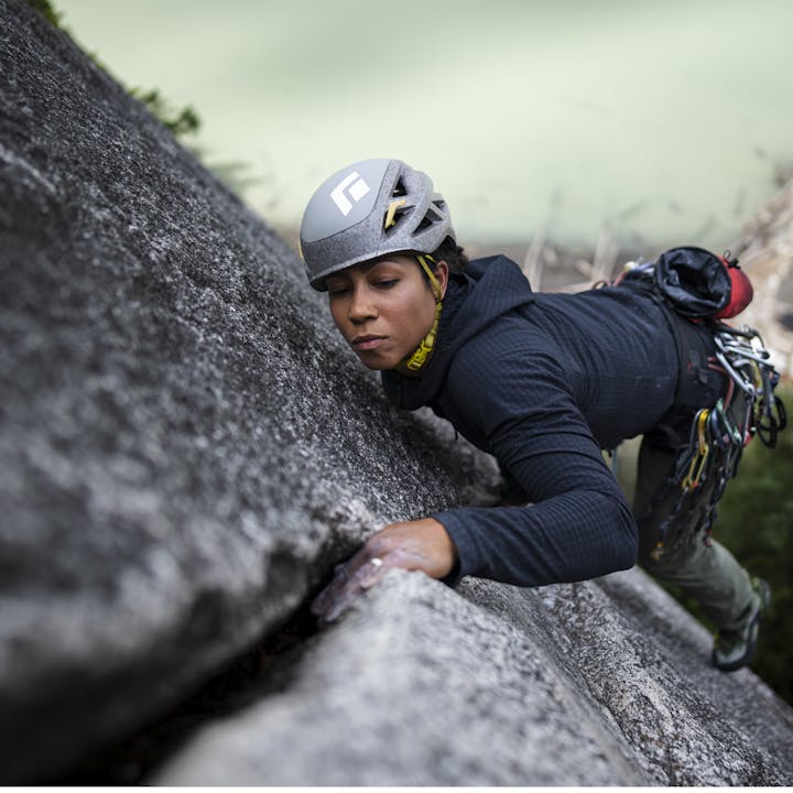 A climber wearing a Black Diamond Vapor Helmet finds the perfect hand jam in Squamish. 