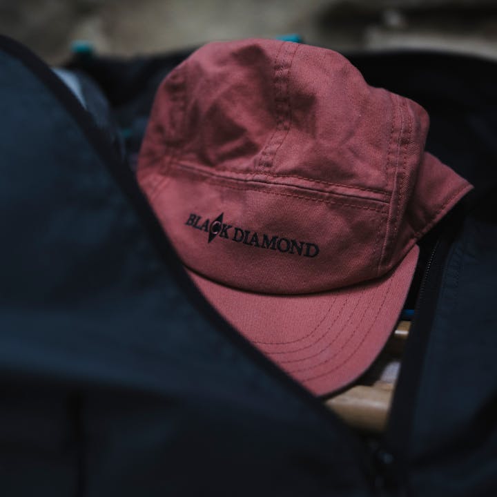 A Black Diamond Hat sits in a pack. 