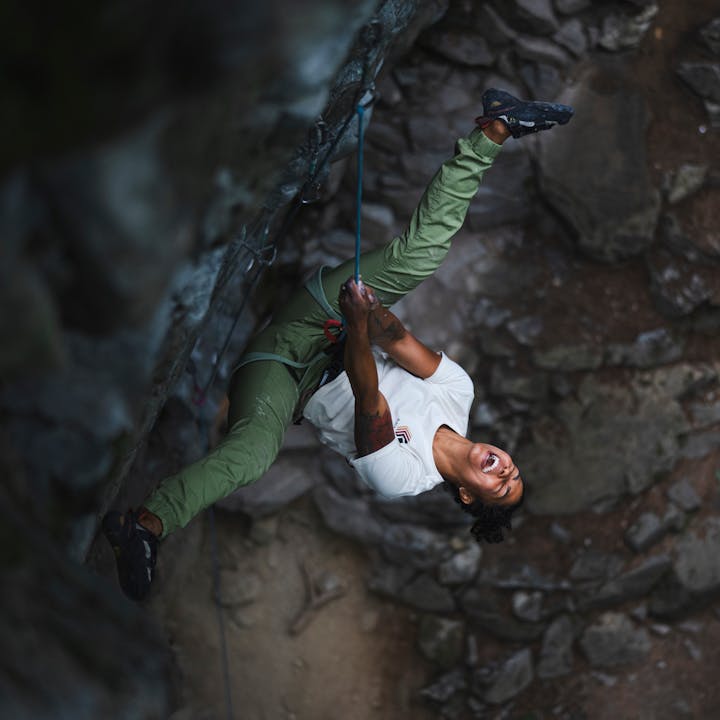 A climber swings around after taking a fall. 