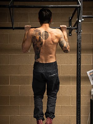 Photo of Sam Elias in upper pull up motion.