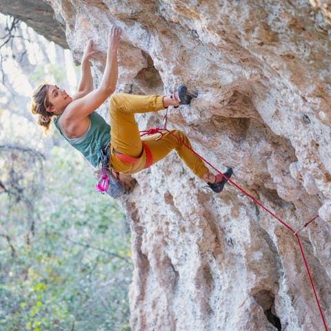 Women climbing on rock