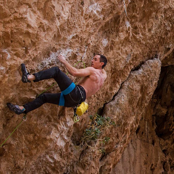 Carlo on an overhanging sport climb