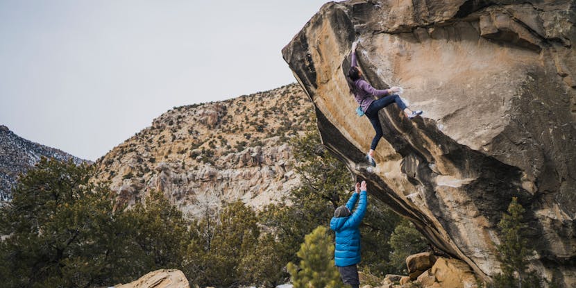 Black Diamond athlete, Natalia Grossman climbing a boulder.