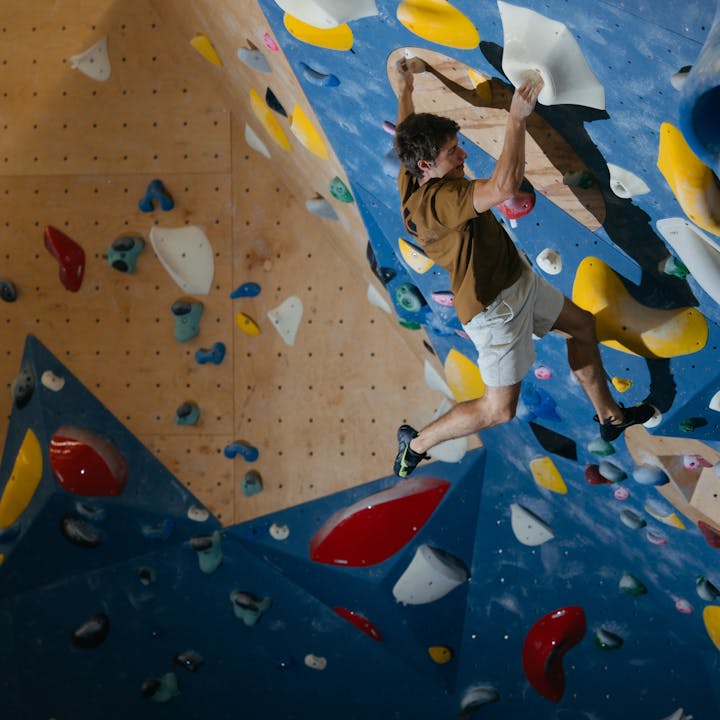 BD athlete Kim Marschner moves up a boulder problem at the gym. 