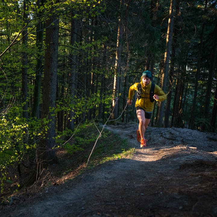 A runner with a Black Diamond Running Vest in the early morning light. 