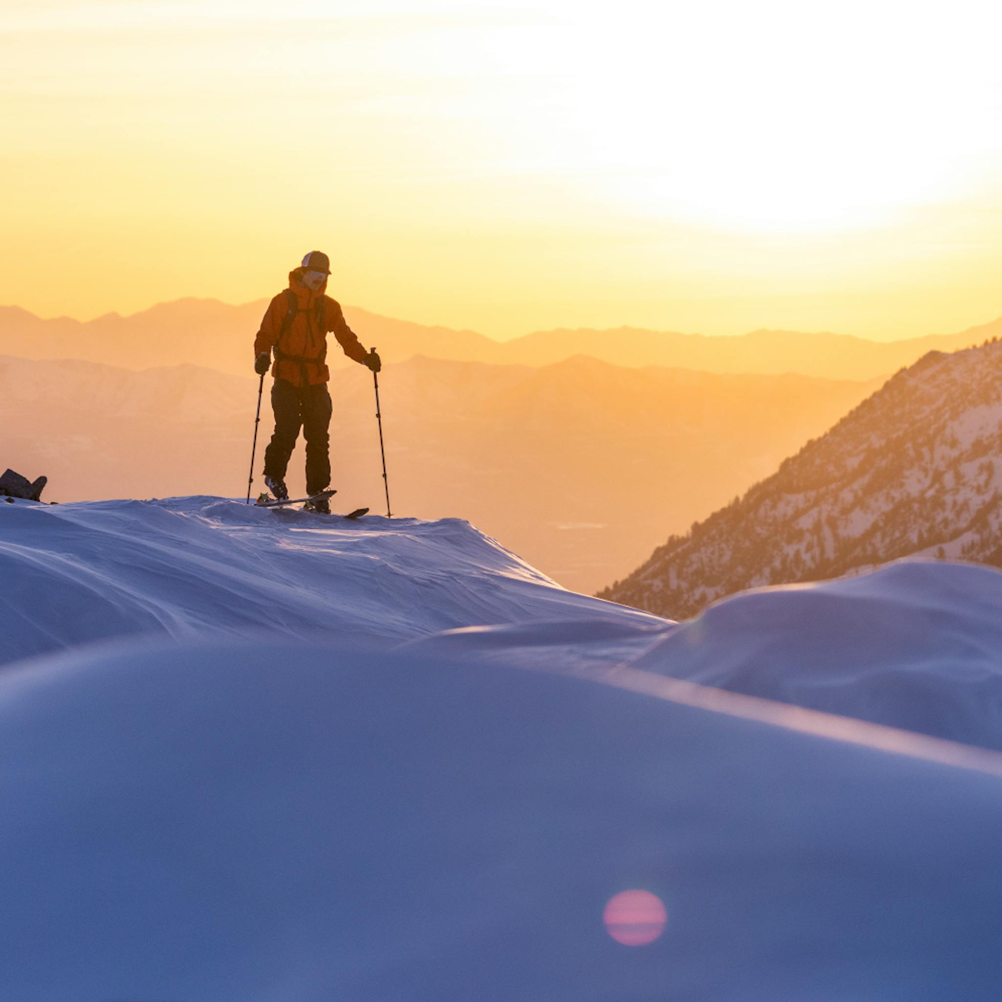 A backcountry skier out for a dawn patrol ski tour.