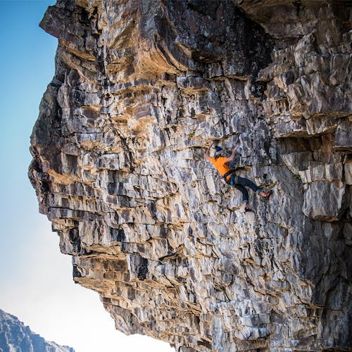 Jackson Marvell climbing rock