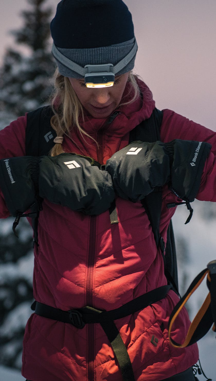 A skier wears the Black Diamond Absolute mitts on a frigid morning.