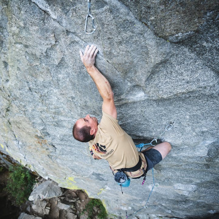 BD athlete Carlo Traversi works his way up a sport climb.
