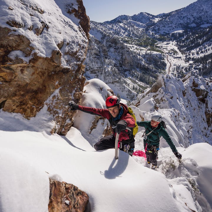 A photo by Christian Adam of two men mountaineering | Mountaineering Gear