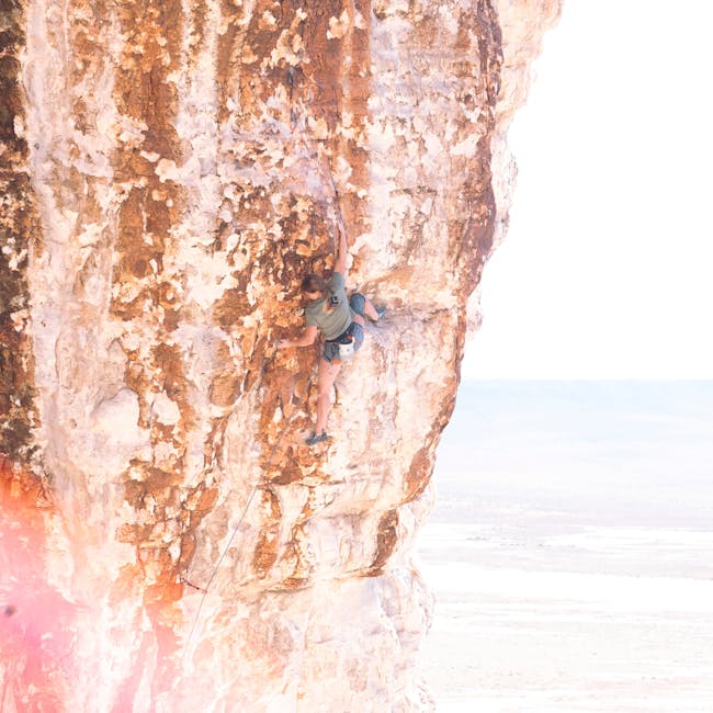 A climber attempts Blood Meridian (5.13c) in Ibex, UT.