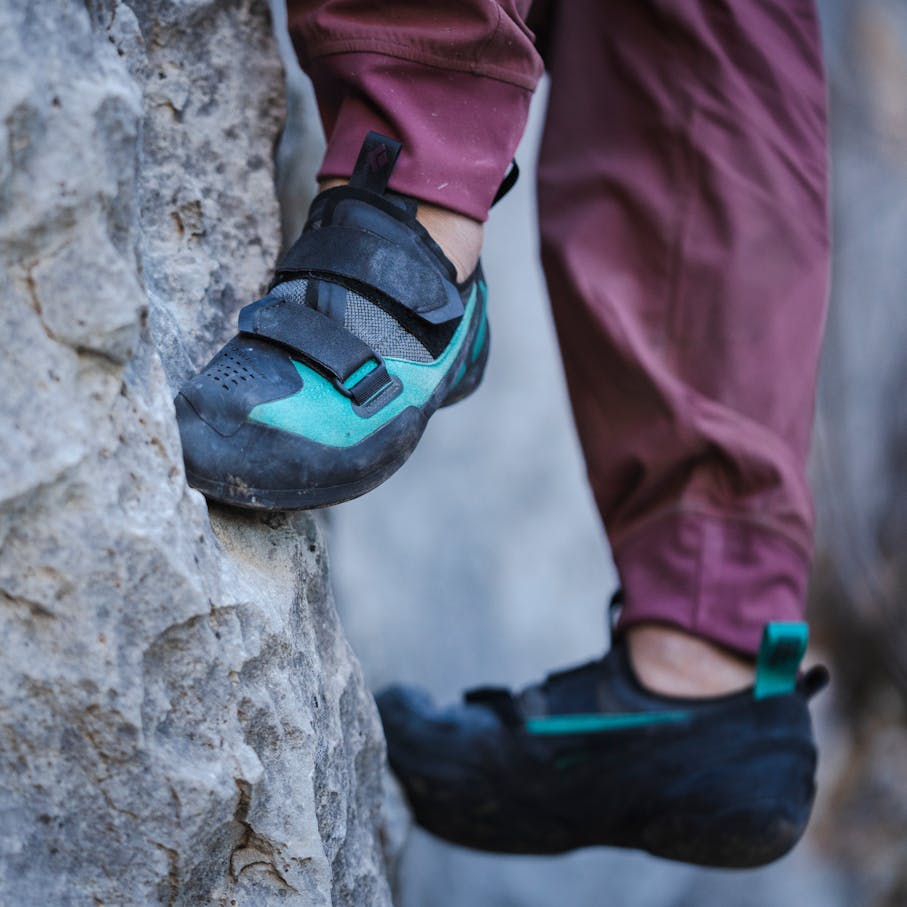 A climber toes into a limestone pocket in her Method Climbing Shoes